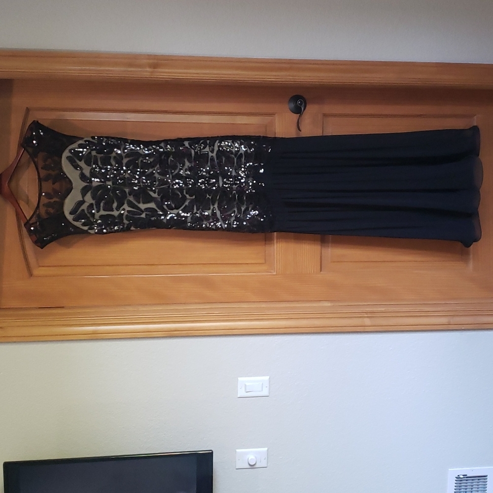 Women's full length black sequined dress
